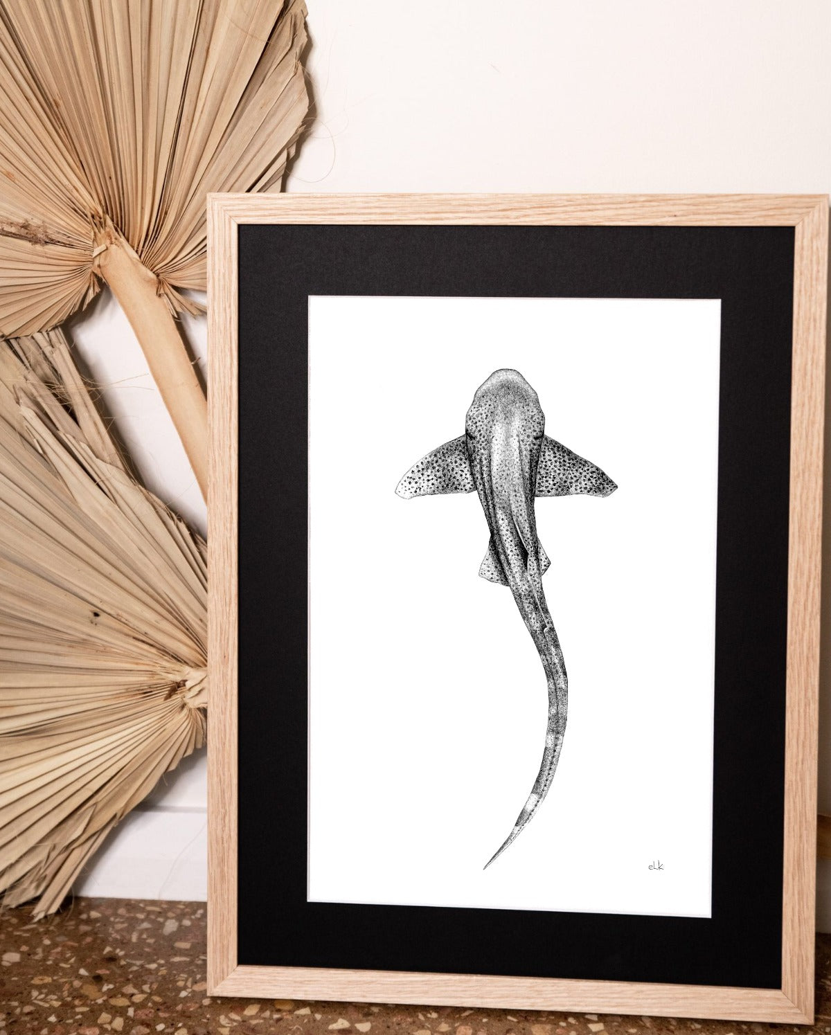 leopard shark to raise money for mental health hand drawn in oak frame dried palm leaves modern home