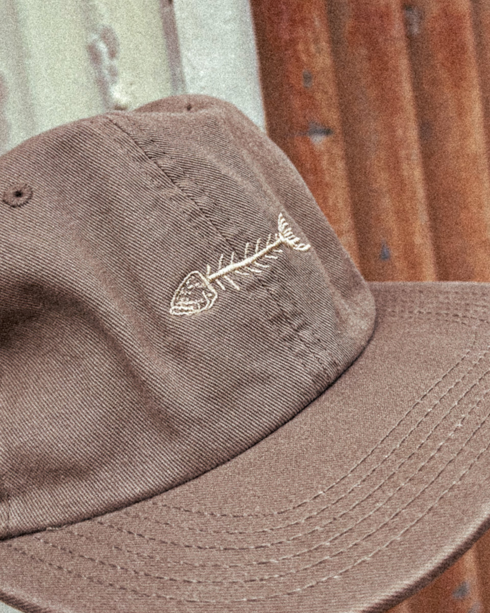 Mocha brown Coral Trout Fish Frame hat up close by Elk Draws 