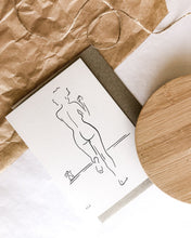 Load image into Gallery viewer, Nude line art drawing by elk draws of woman drinking coffee on 100% recycled paper greeting card