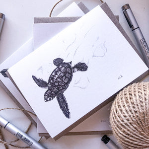 Hand drawn black and white turtle hatchling greeting card by elk draws