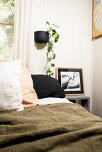 Load image into Gallery viewer, She limited edition print with linen bedding and hanging plant