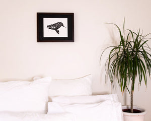 Detailed southern right whale above linen bed
