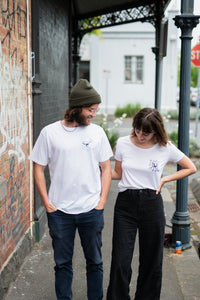 man and women in organic cotton white tshirts by elk draws