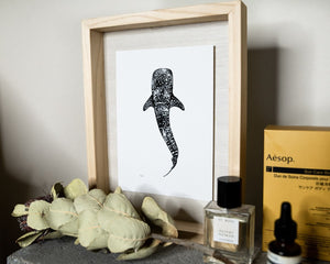 black and white whaleshark print by elk draws on bedside table