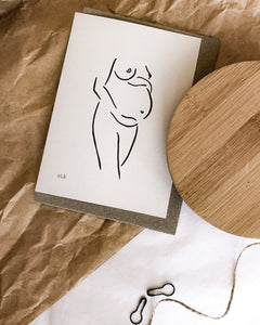 100% post consumer recycled waste greeting card with nude art by elk draws on the front of a pregnant woman expecting a bub